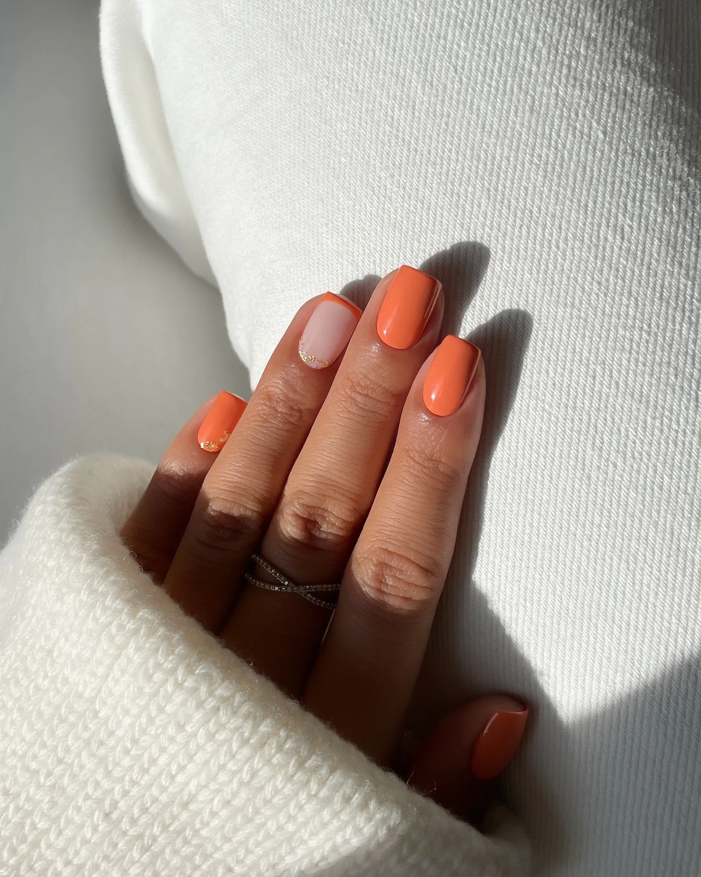 coral orange almond glossy nails