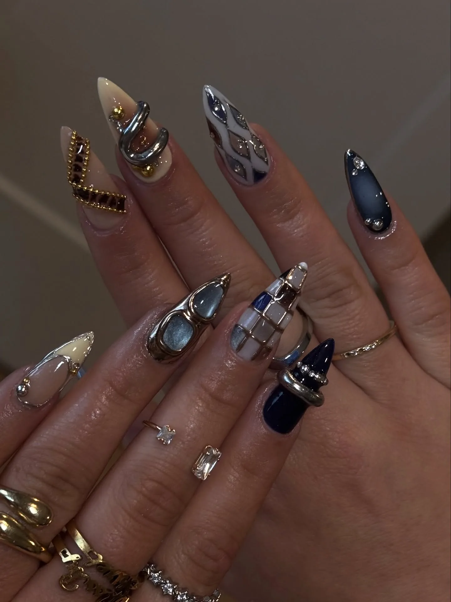chrome stiletto sculptural armor nails