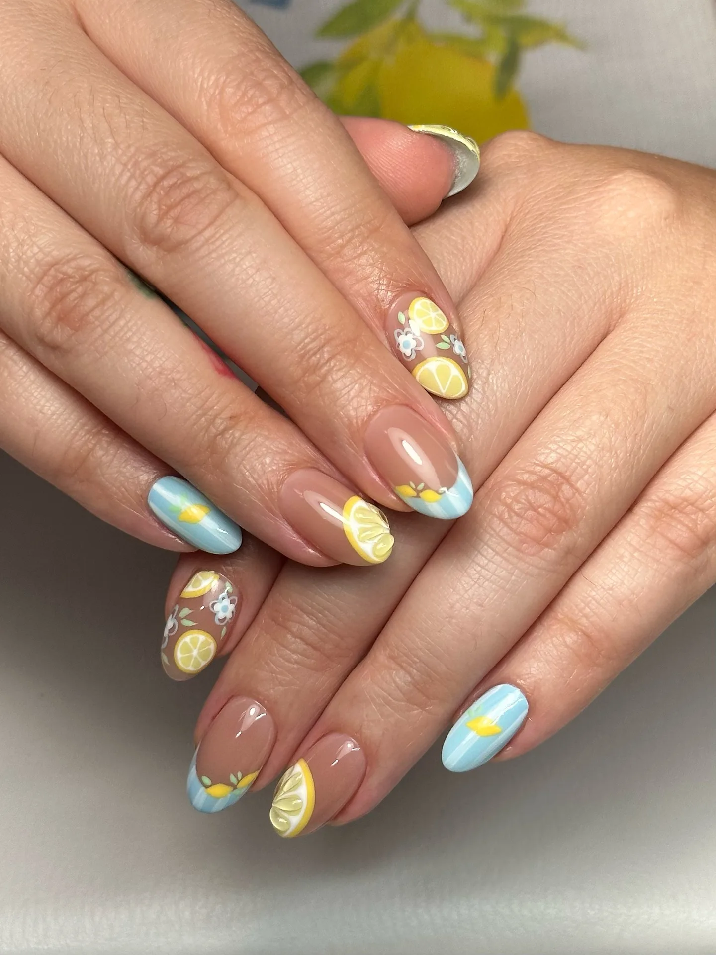 nude almond lemon floral nails