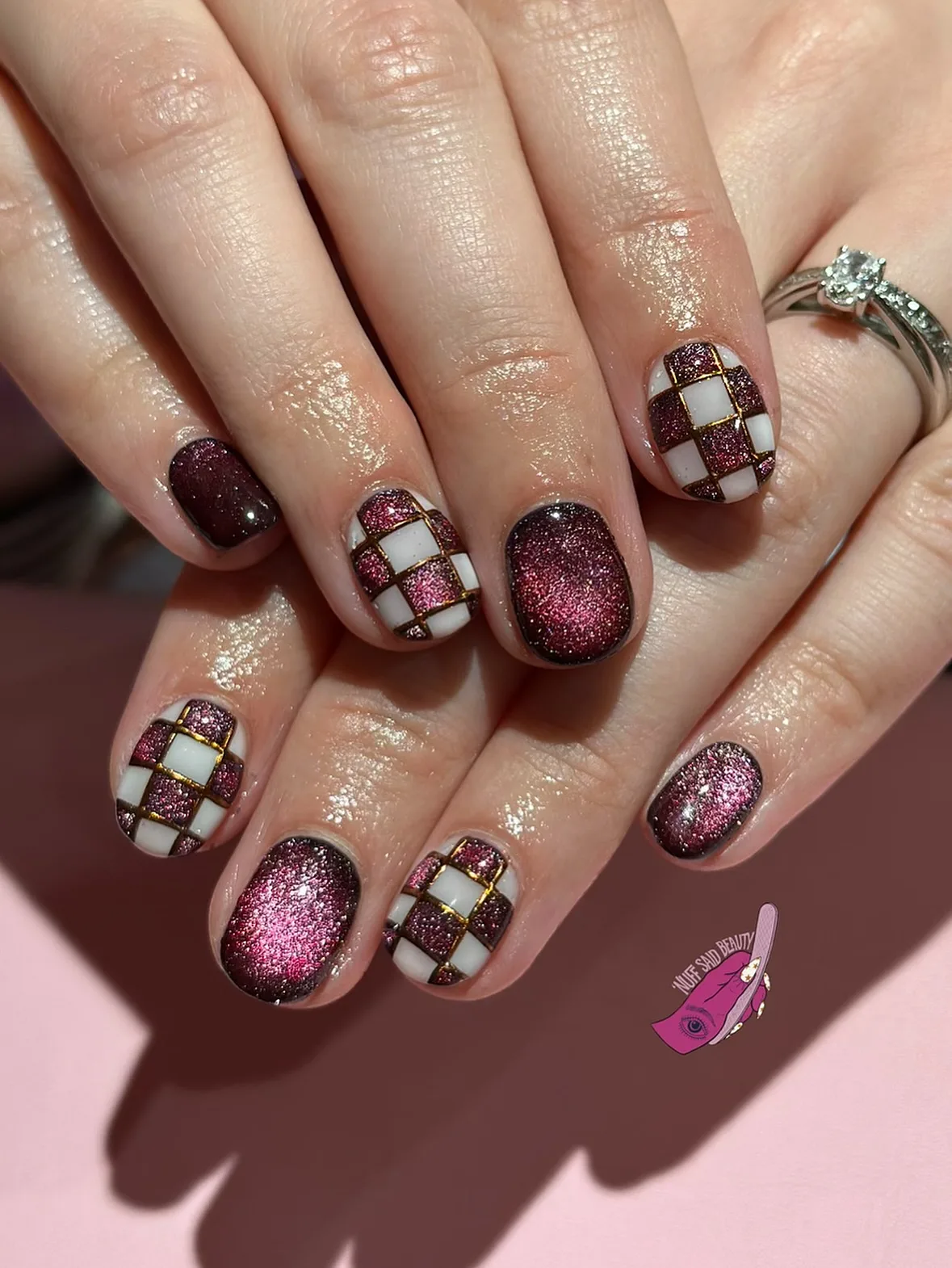 burgundy oval checkerboard shimmer nails