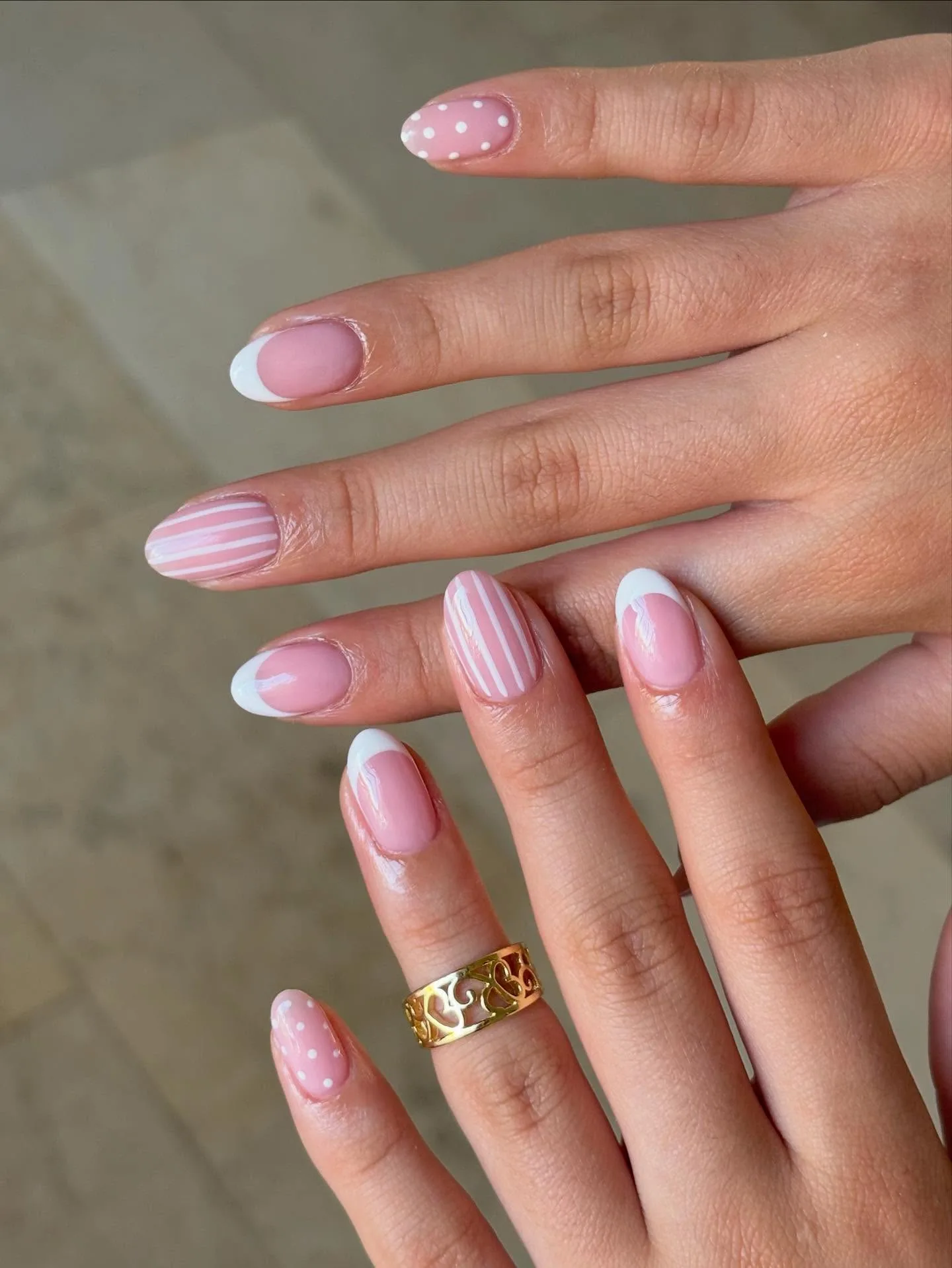 pink white oval mixed design nails
