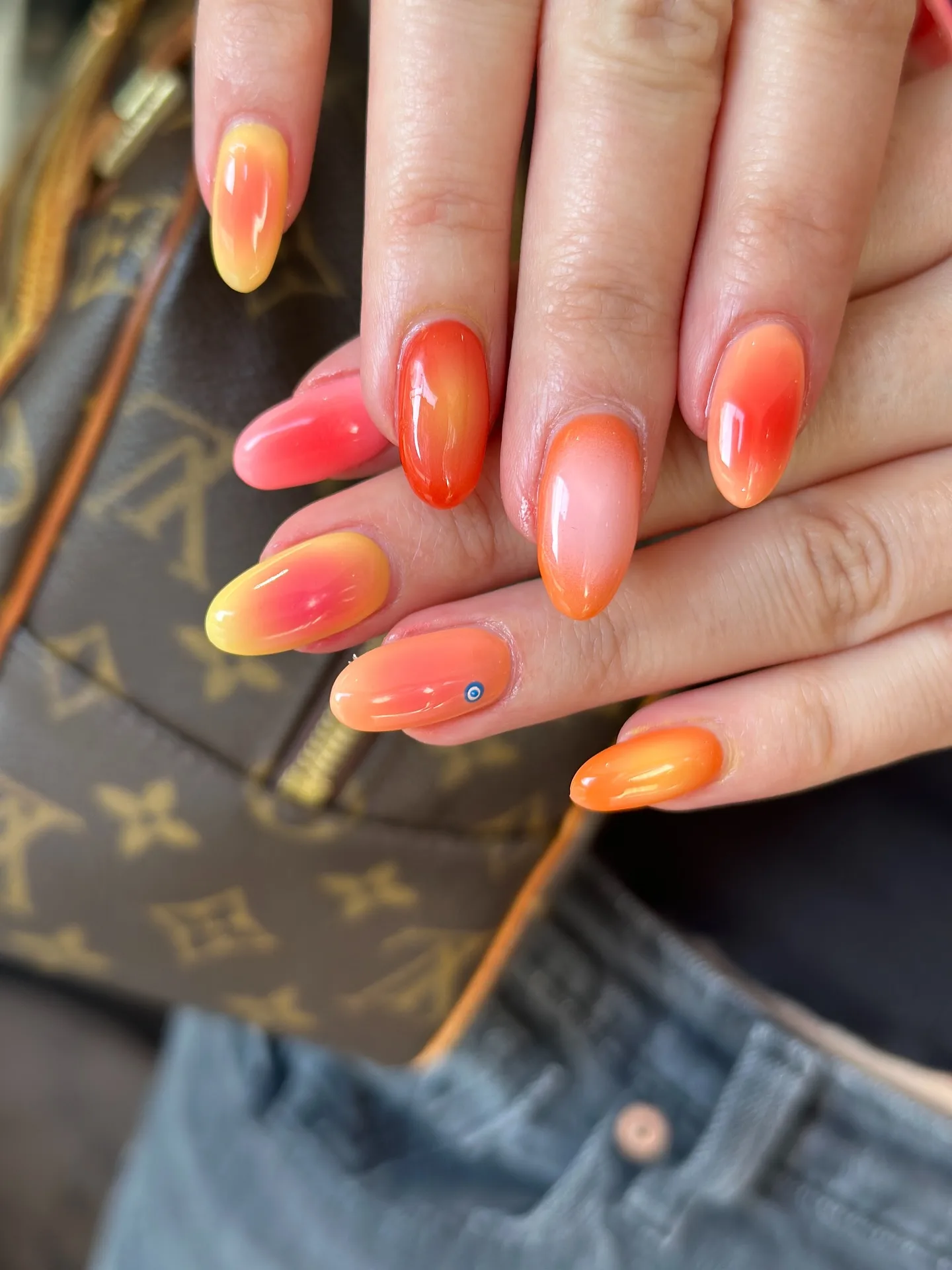 coral orange gradient oval nails