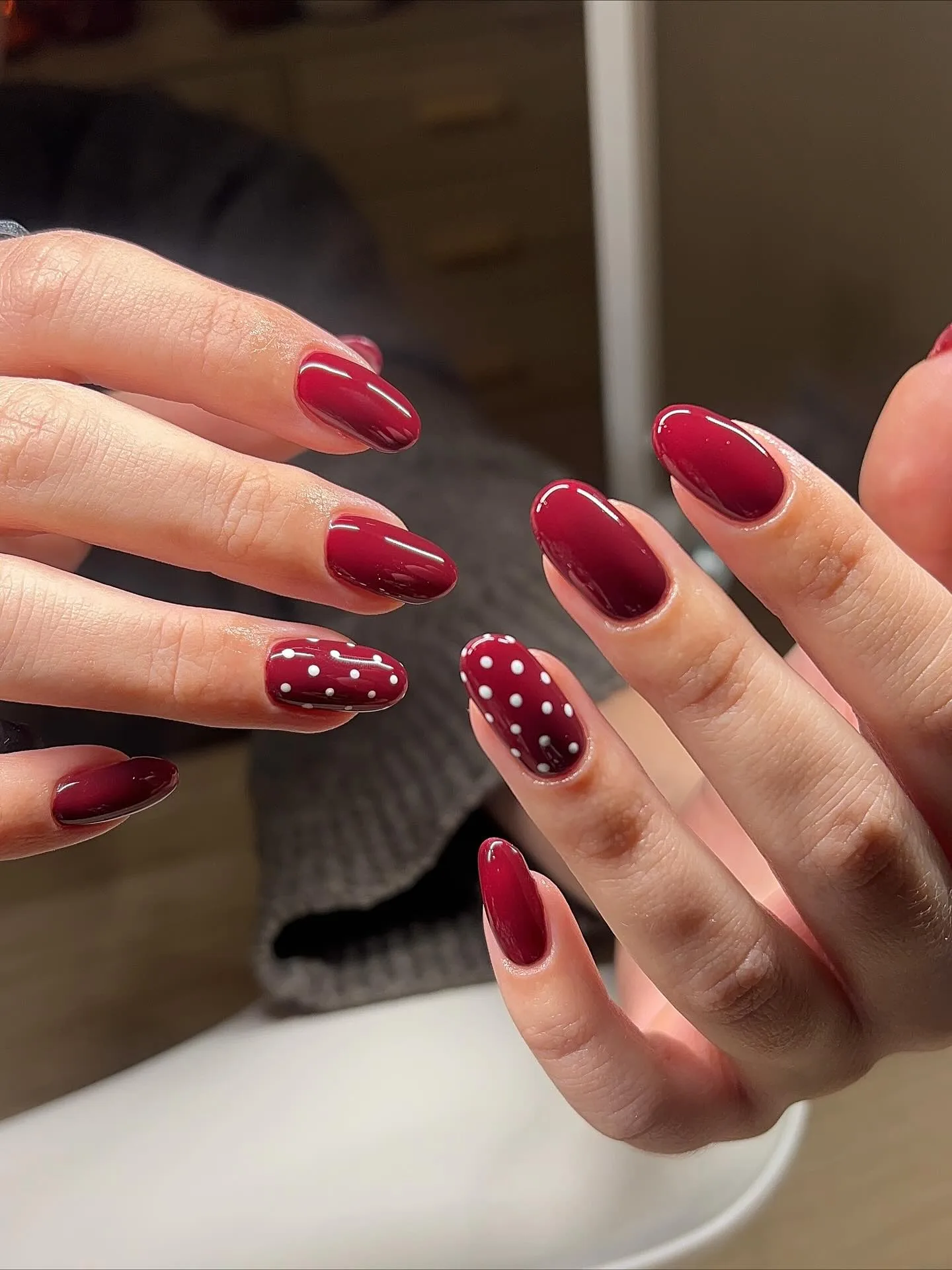 burgundy oval polka dot nails