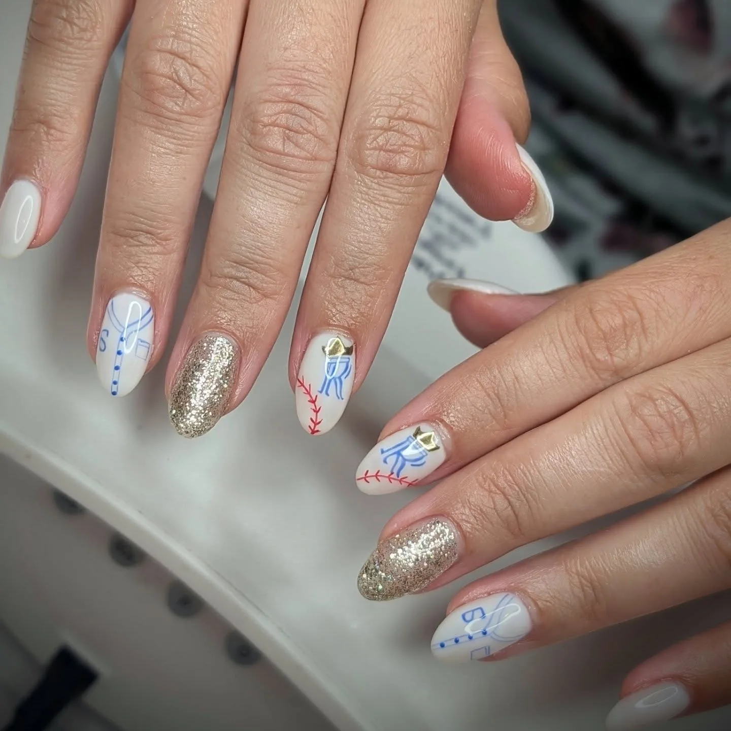 white almond baseball design nails