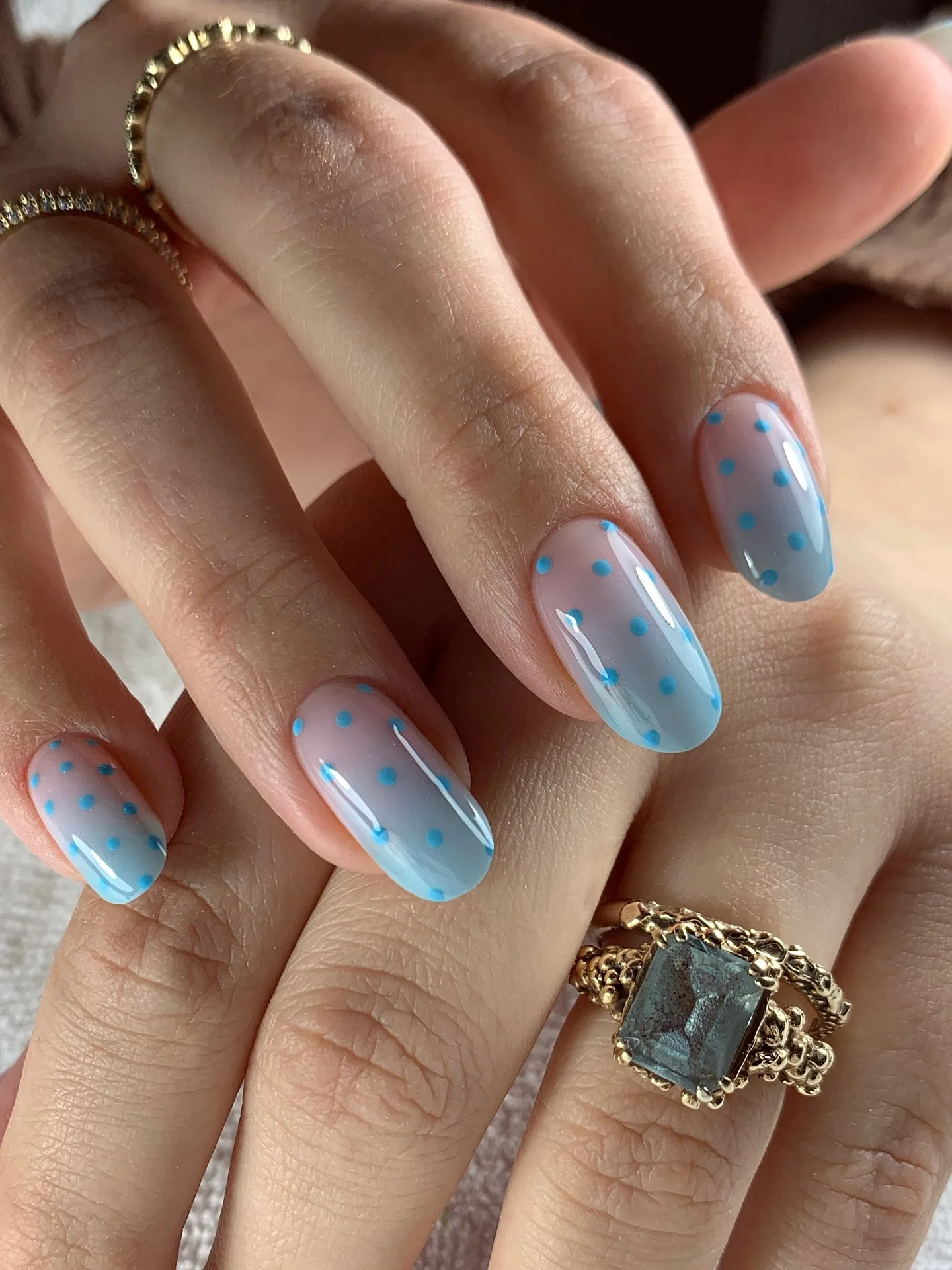 translucent blue oval dotted nails
