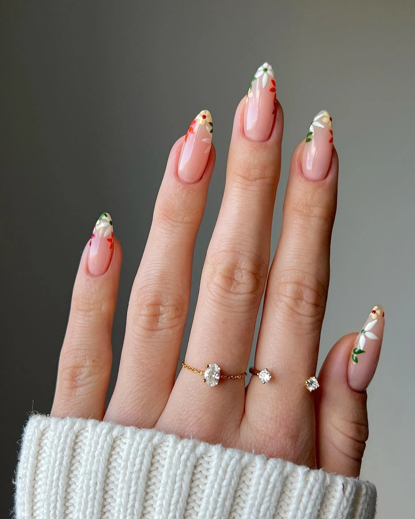 nude almond floral tip nails