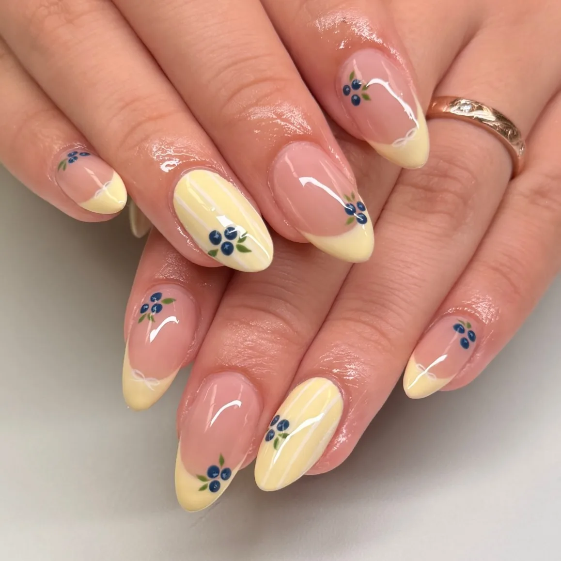 pink yellow almond blueberry nails