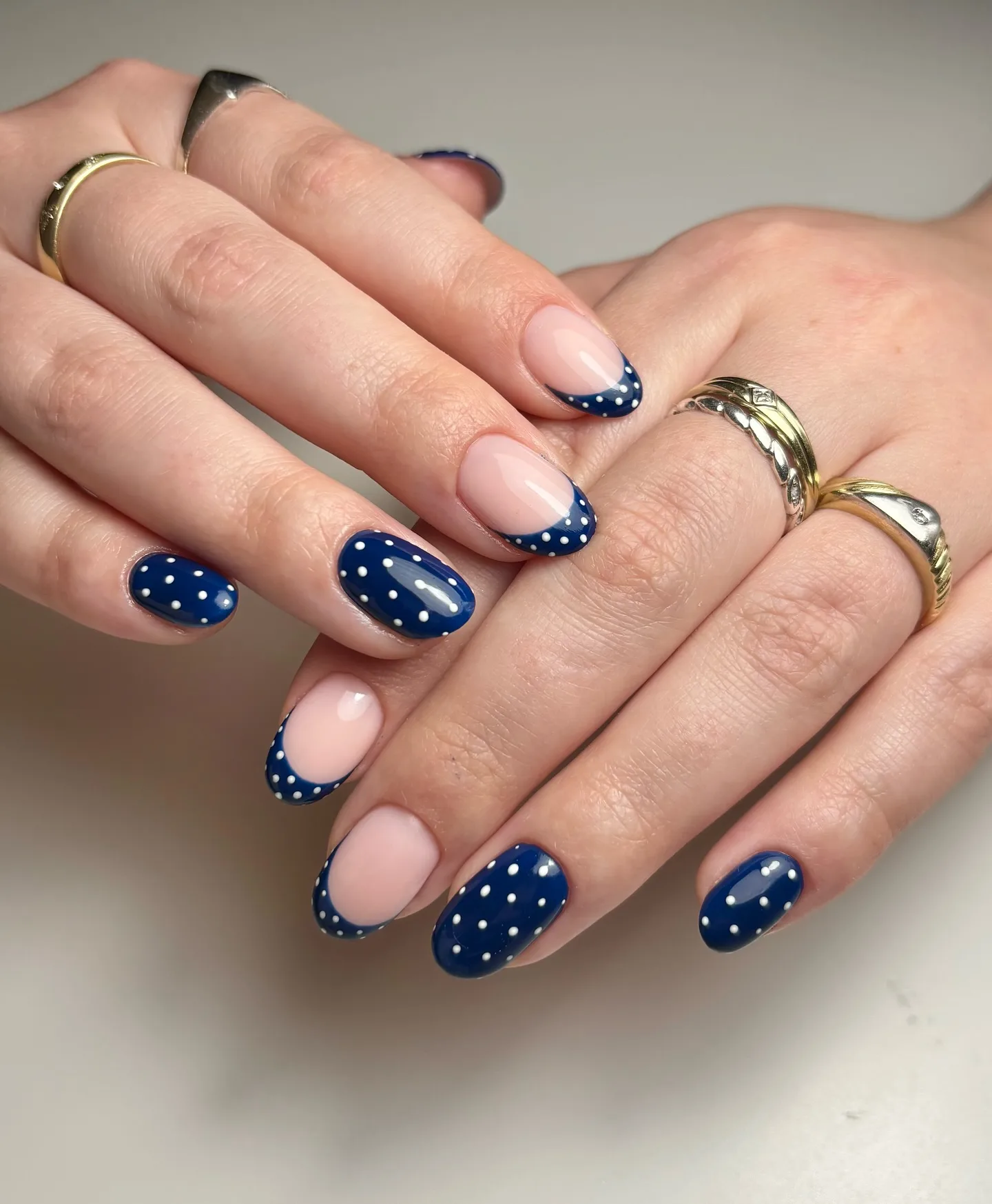 navy blue oval polka dot nails