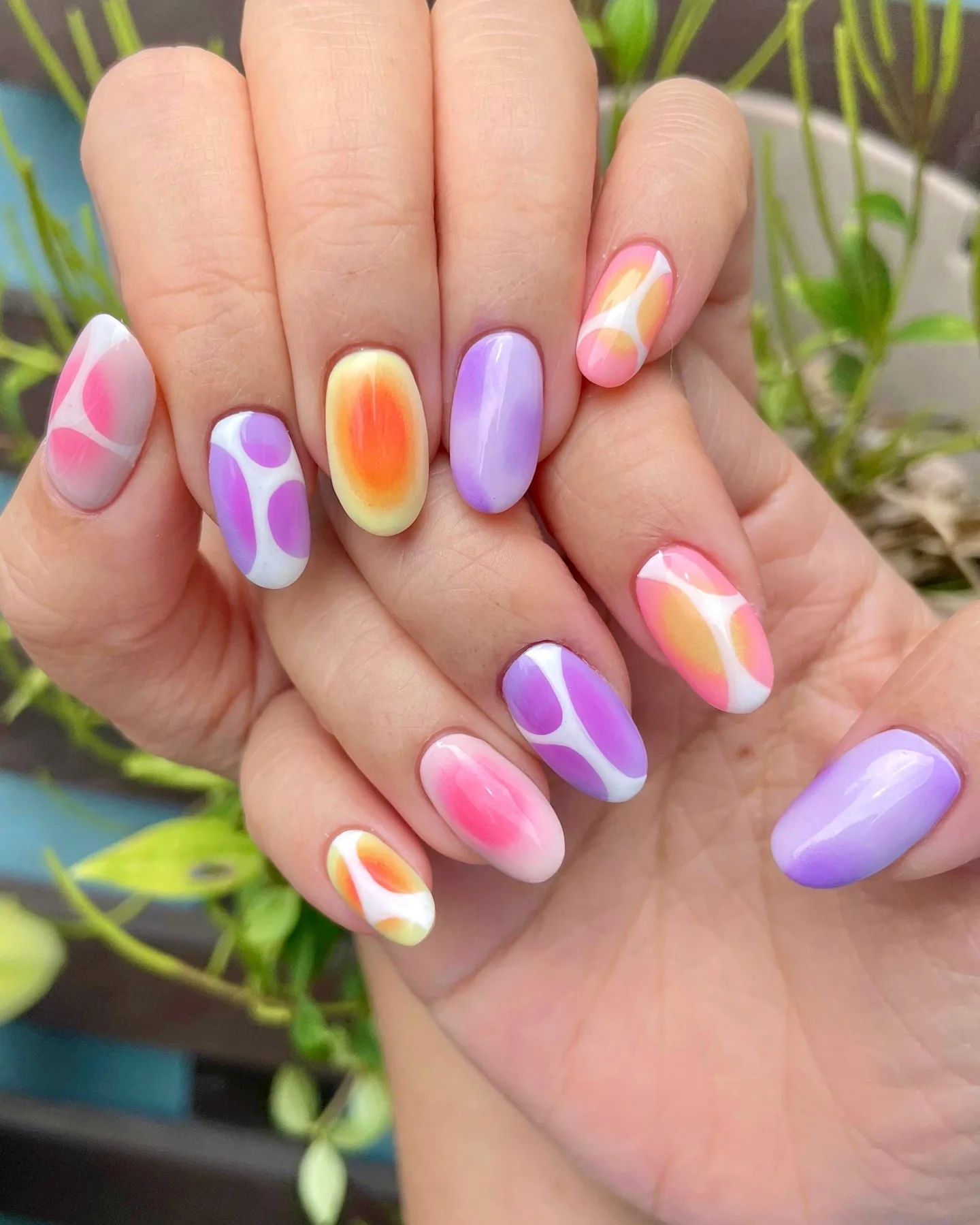 multicolor oval gradient swirl nails