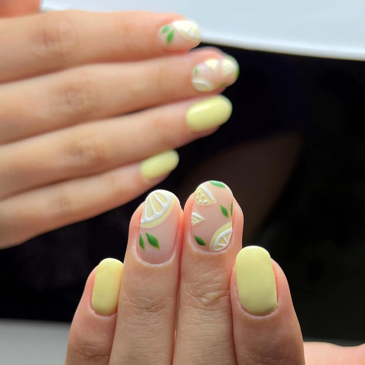 yellow oval lemon design nails