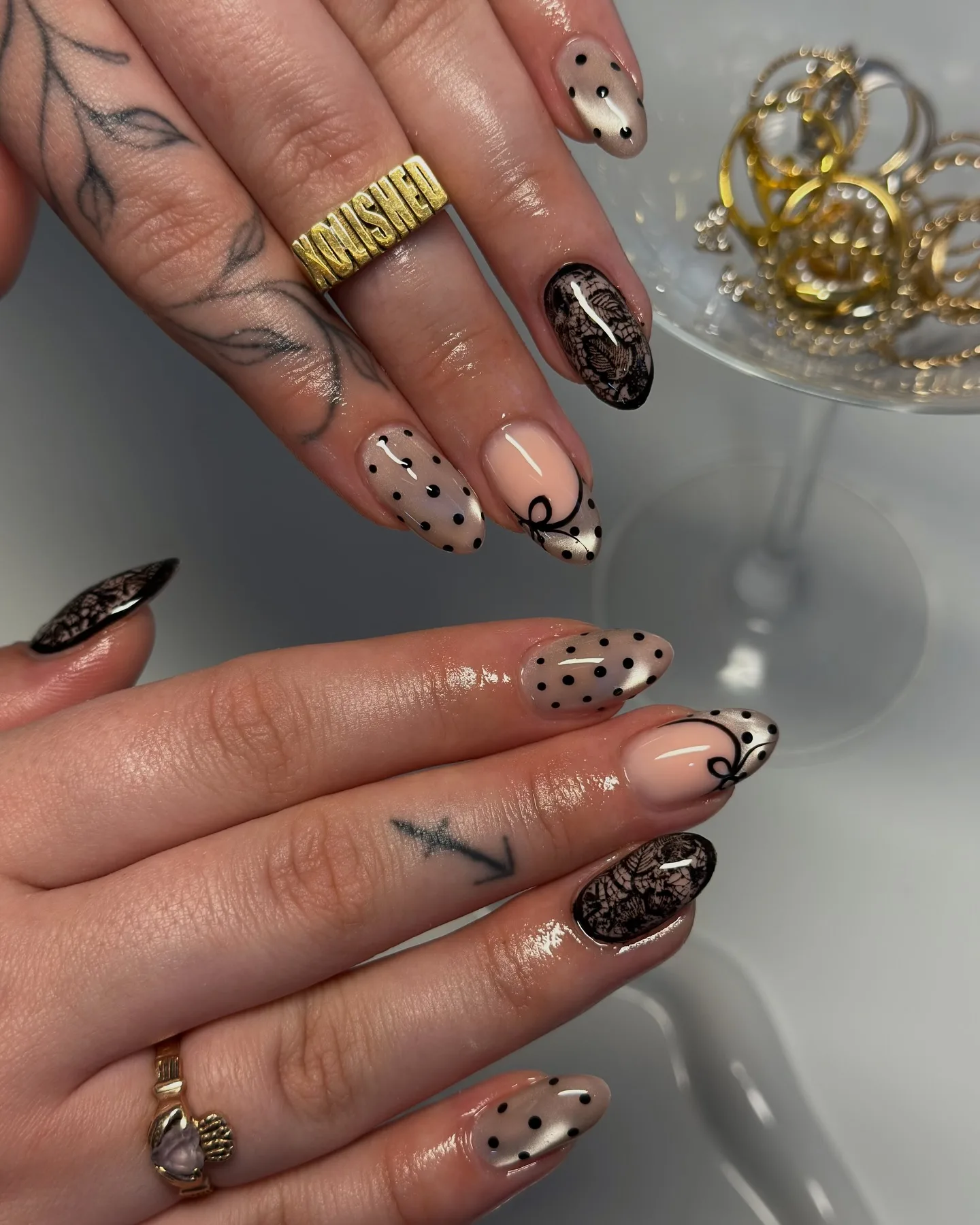 nude pink almond polka dot nails