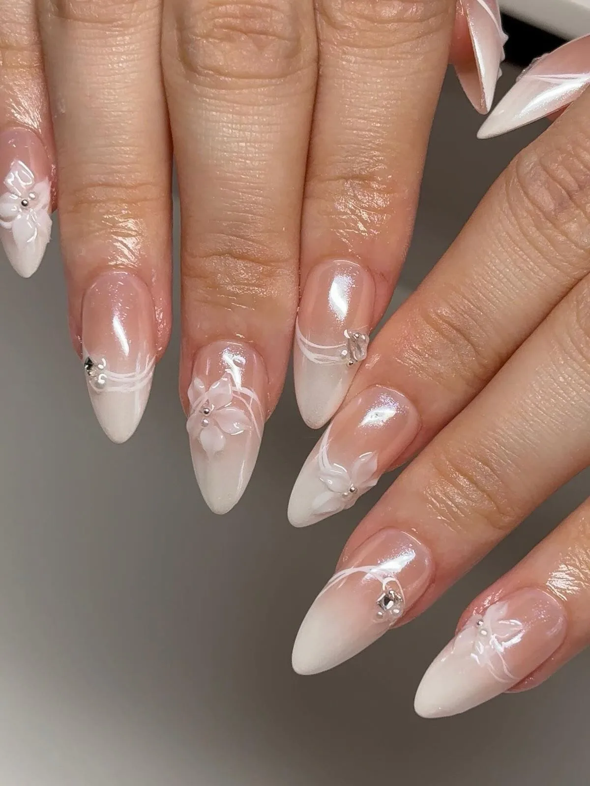 peachy pink almond bow nails