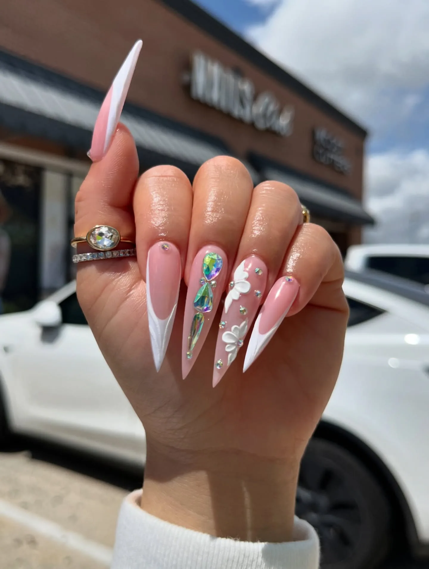pink stiletto holographic crystal nails