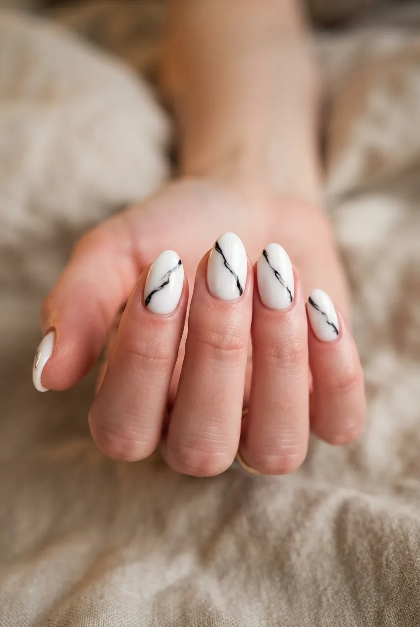 white almond black marble nail art