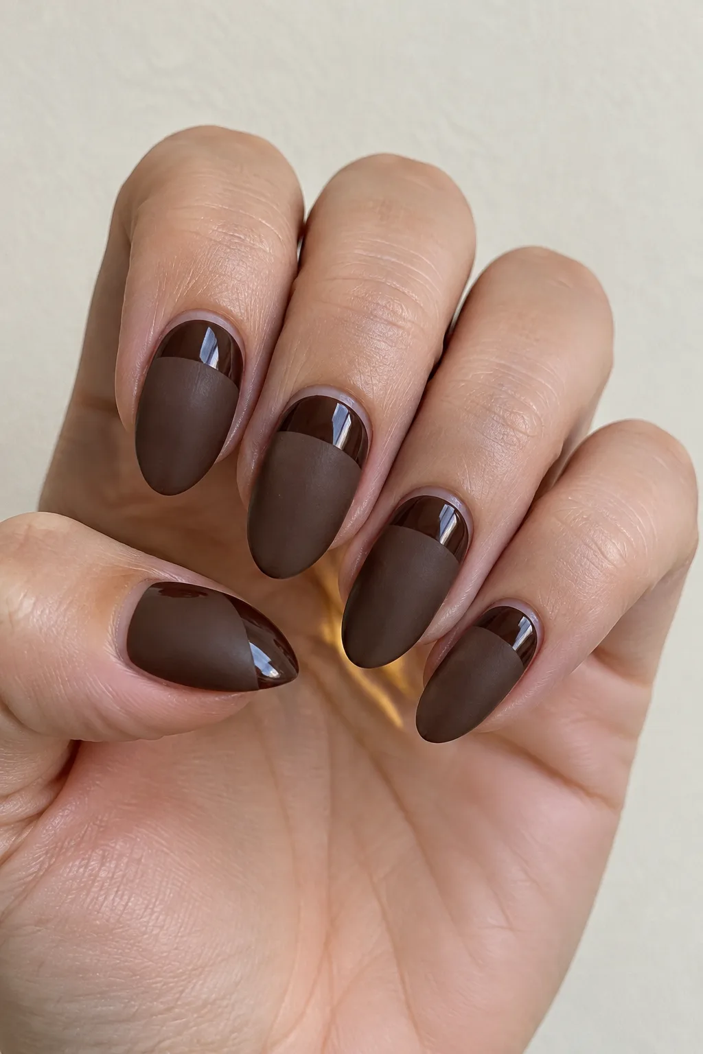 Matte chocolate brown almond nails with glossy tips for contrast