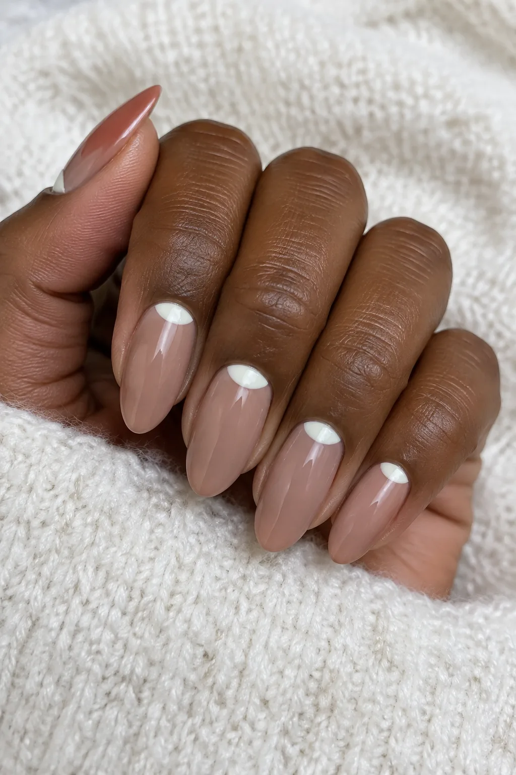 Mocha nude nails featuring delicate pearl half-moon cuticle accents