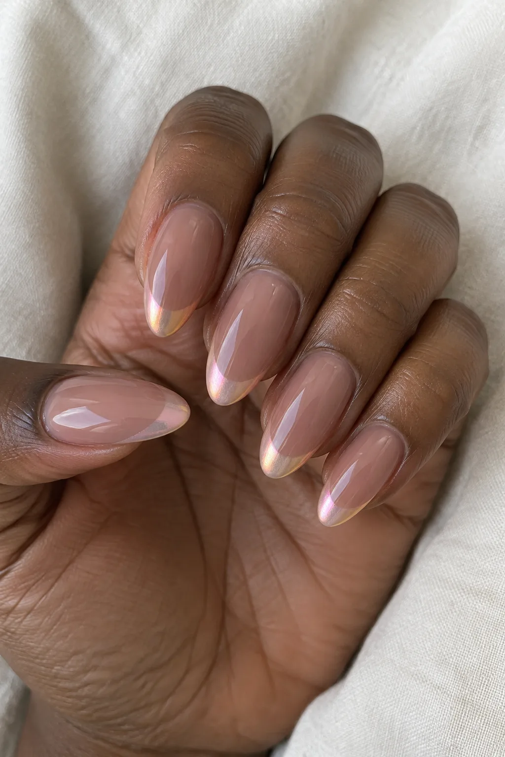 Cocoa brown nails finished with iridescent pearl tip accents