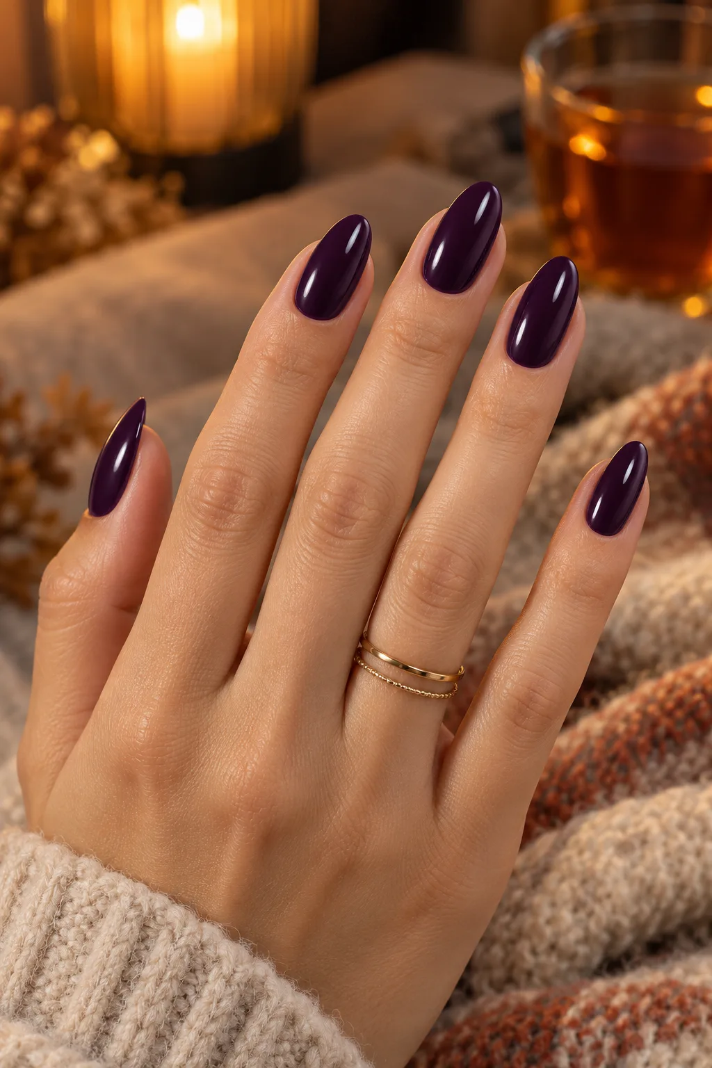 Glossy deep plum almond nails, a classic dark plum nails for fall look