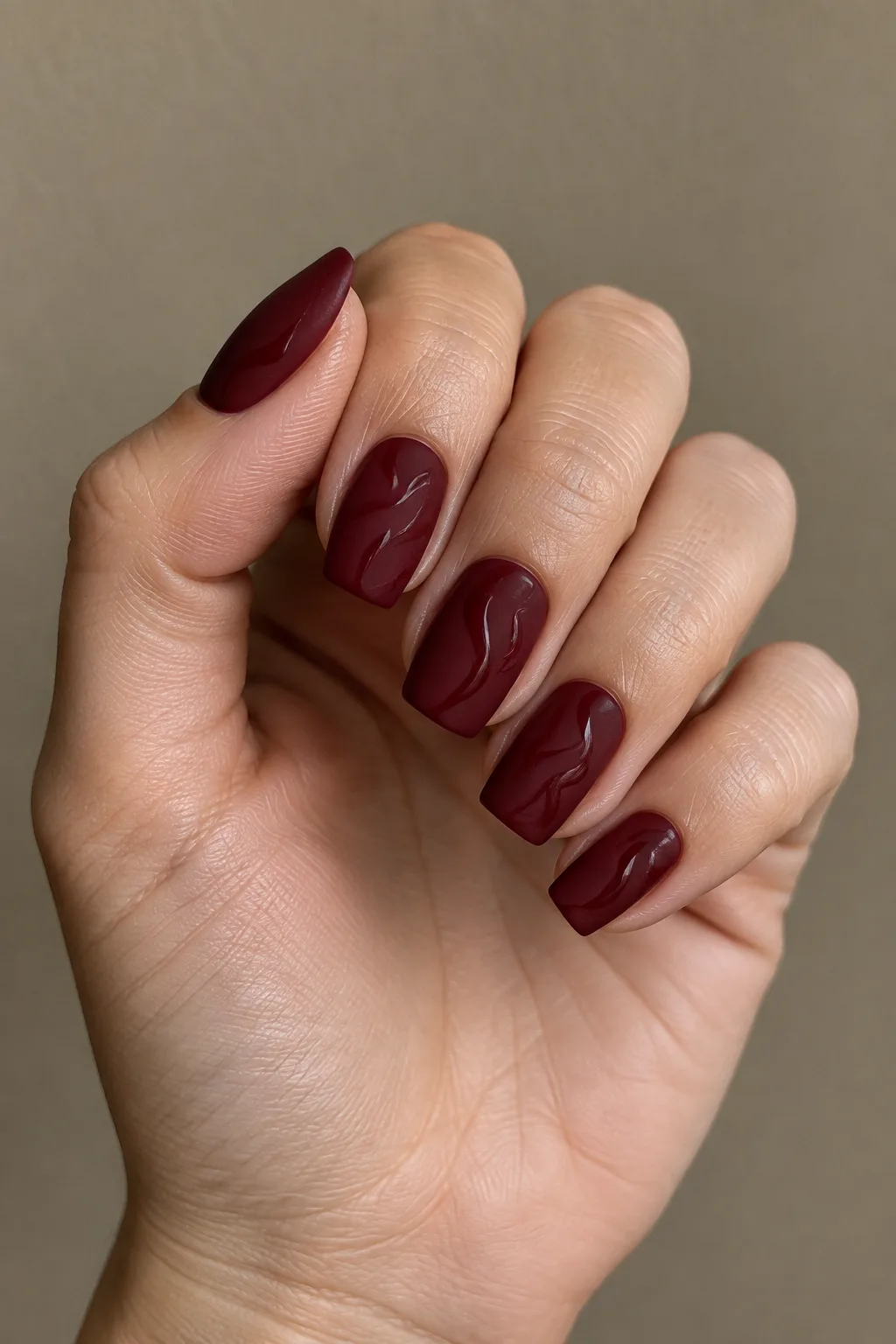 Matte wine with glossy swirl dark red fall nails on square shape