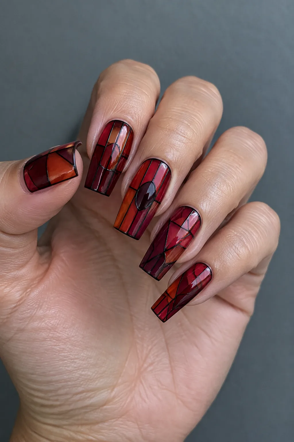 Stained glass panel dark red fall nails on long square nails