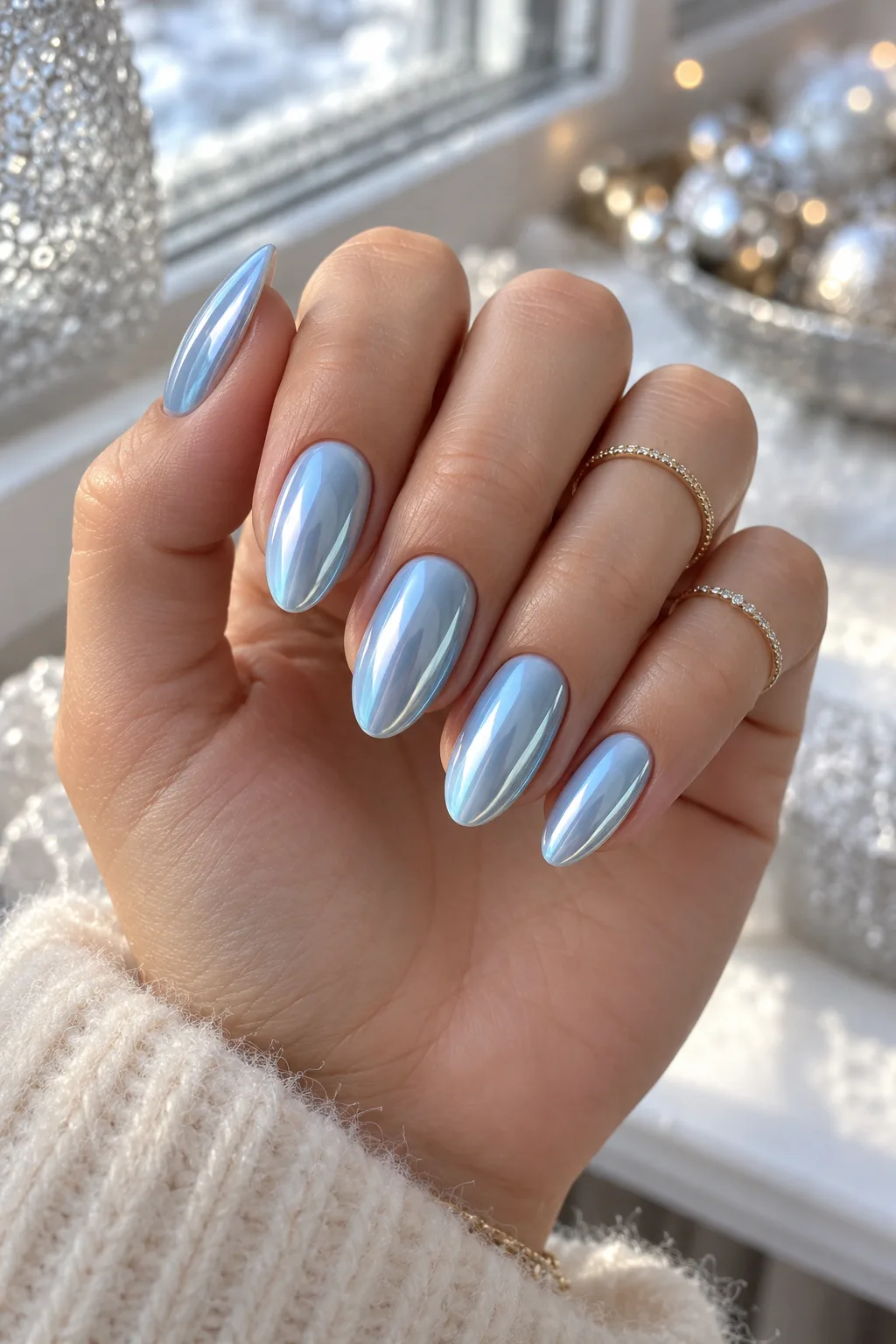 Ice blue chrome almond nails, December nail ideas not Christmas