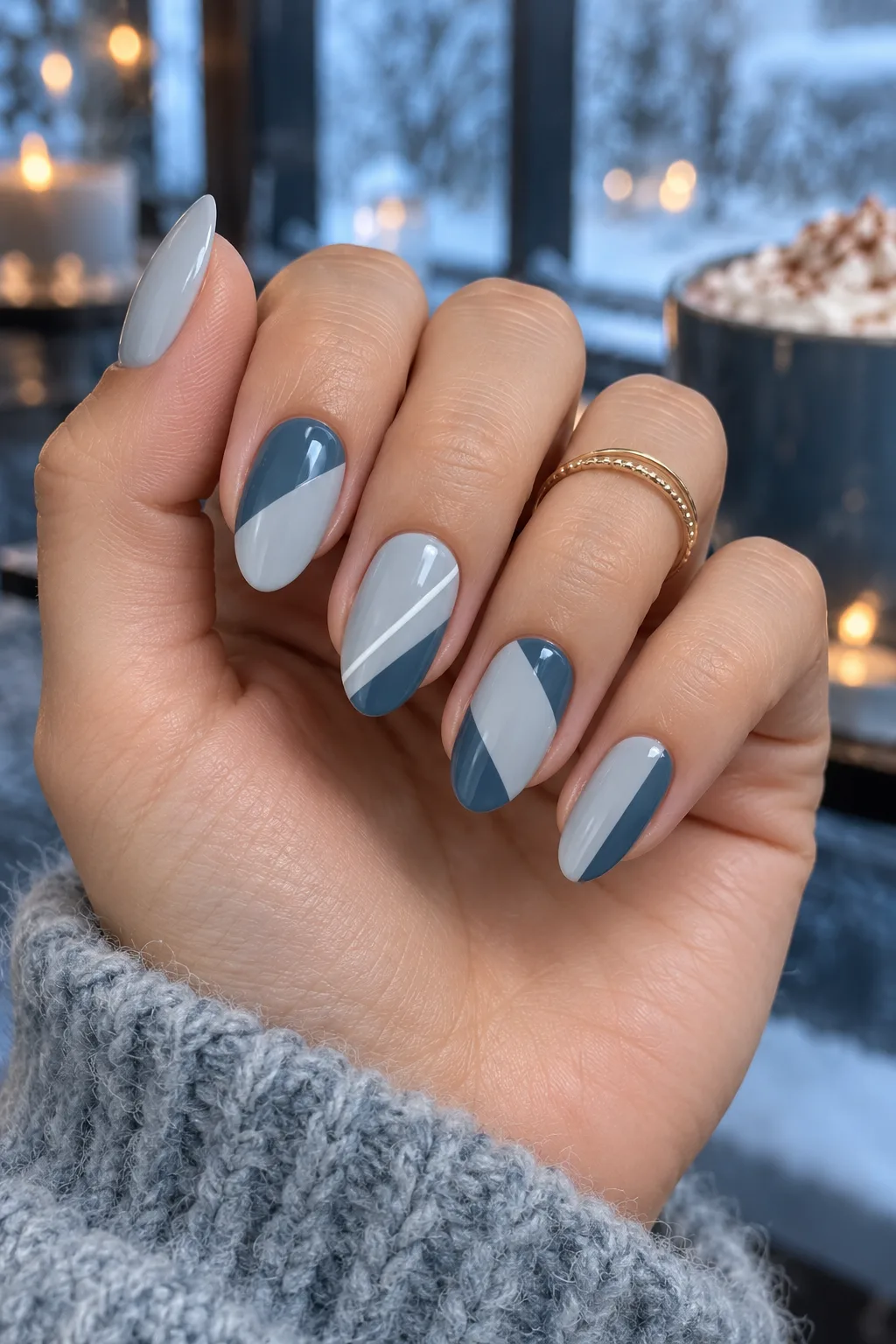 Pale grey nails with steel blue abstract blocks, December nail ideas not Christmas