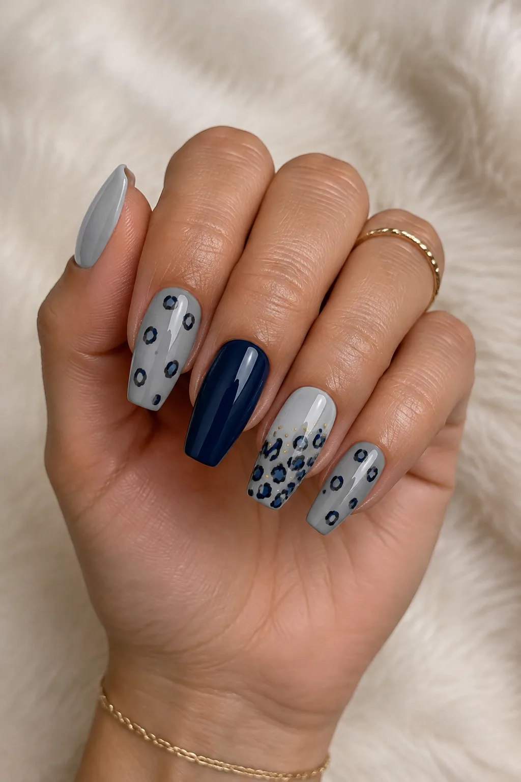 Dove grey nails with navy leopard print spots for winter