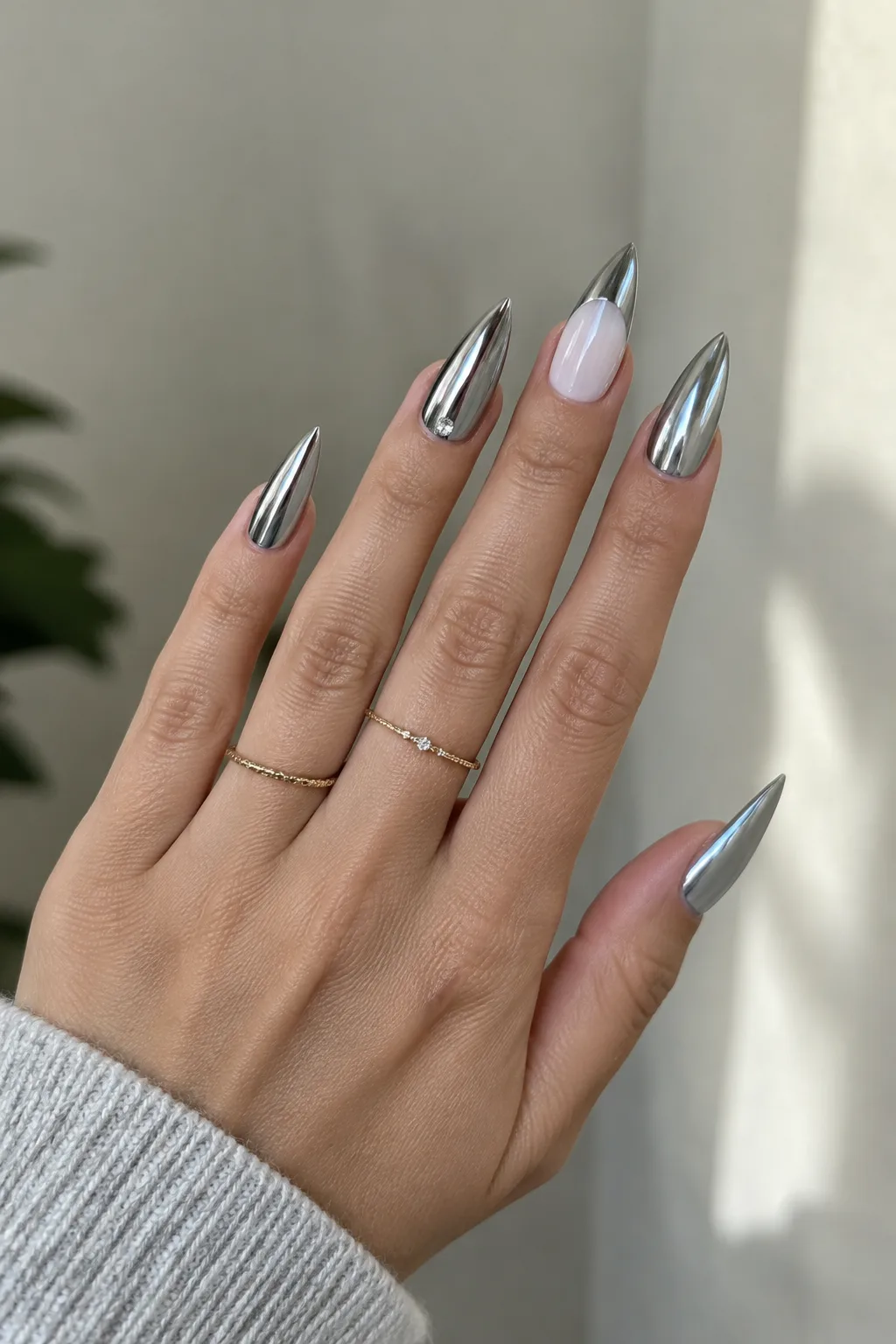 Mirror silver chrome New Year's Eve nails 2027 on long stiletto nails