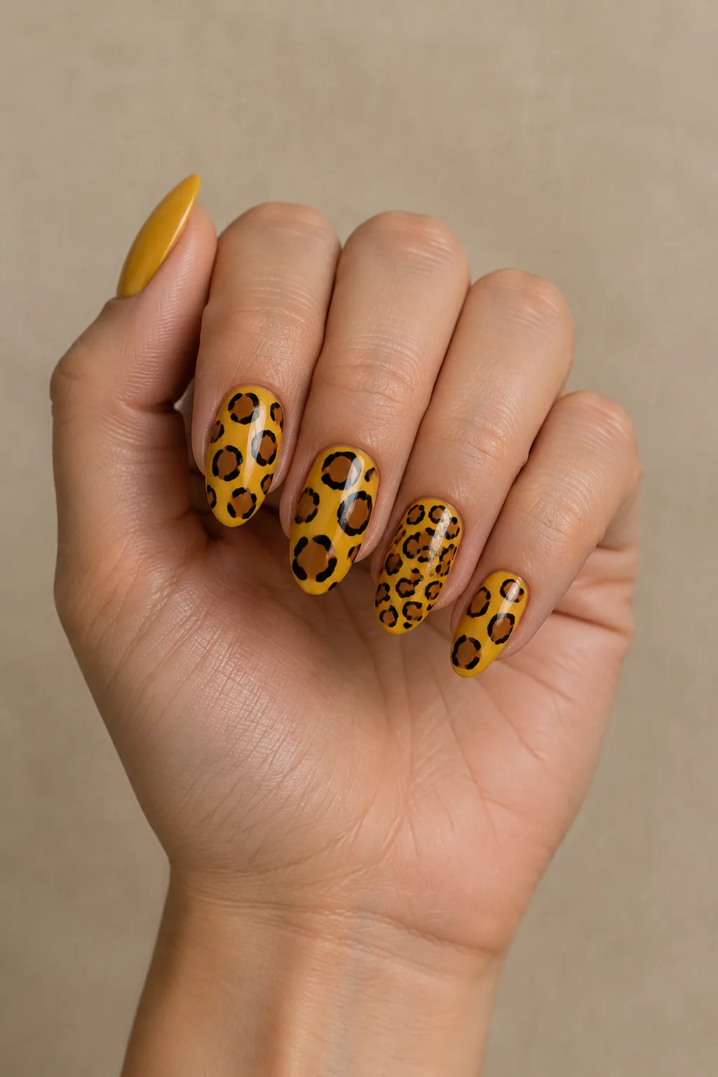 Mustard and espresso leopard print almond nails for November