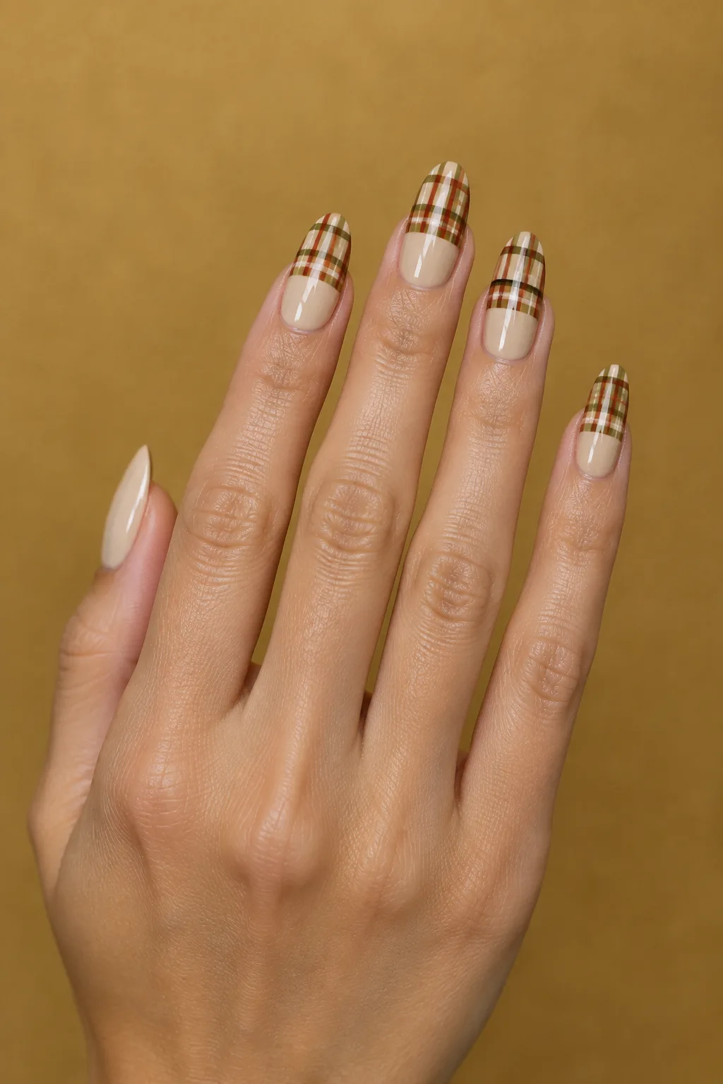 Cream nails with rust and olive plaid tips, fall October nail idea 2026