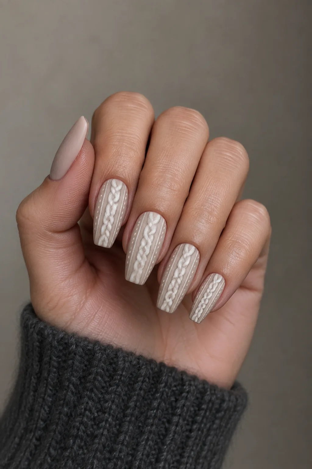 Matte oatmeal cable knit nails on coffin shape for October 2026