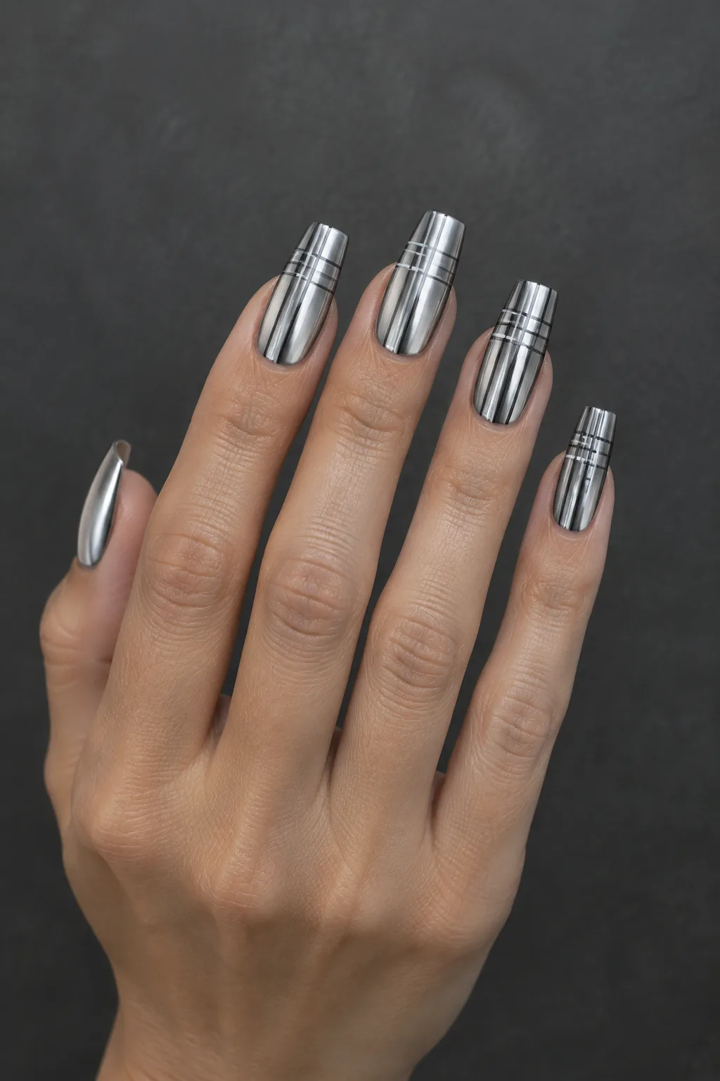Pewter chrome plaid nails for fall with charcoal grid lines on long square nails
