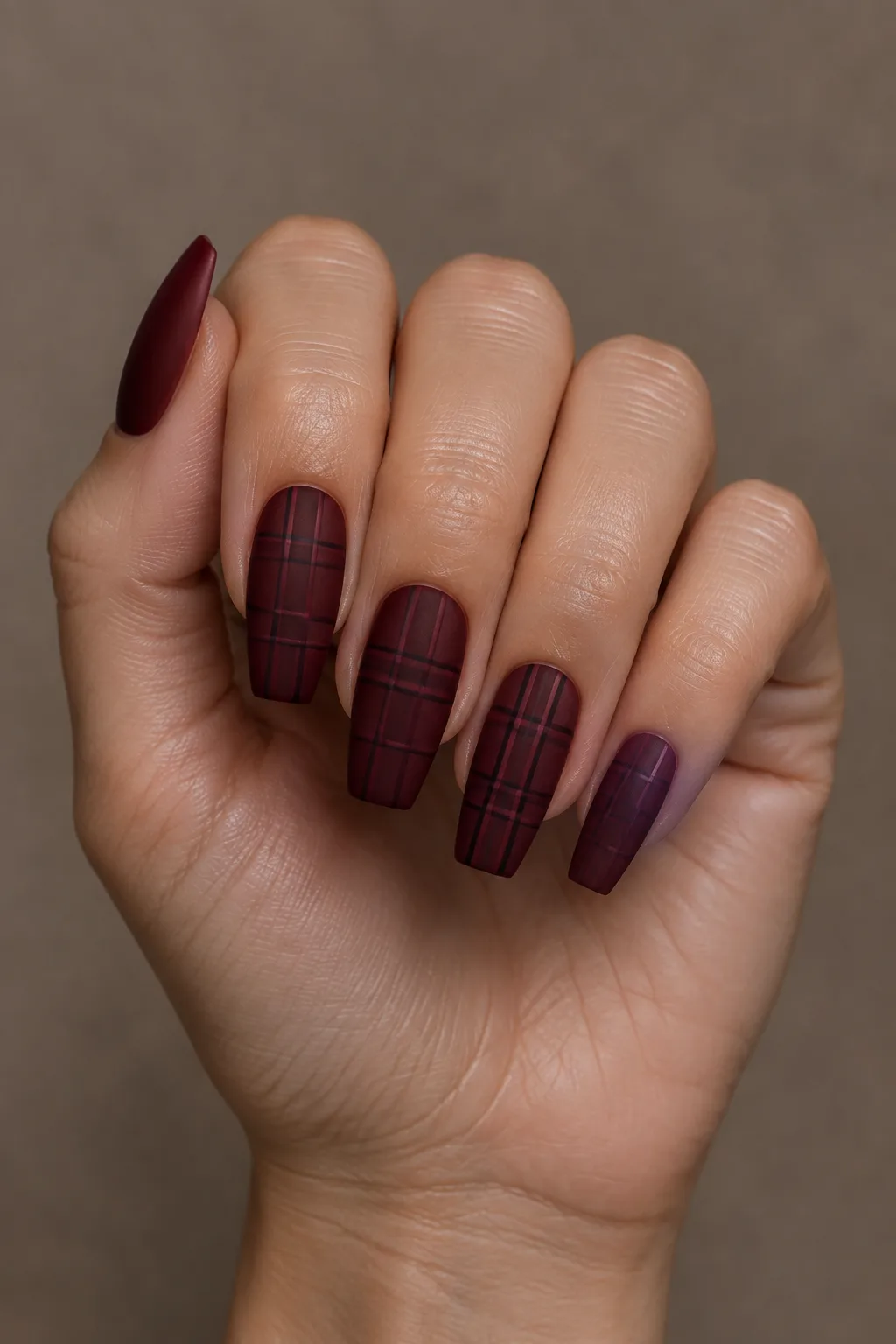 Matte oxblood tonal plaid nails for fall on medium coffin nails