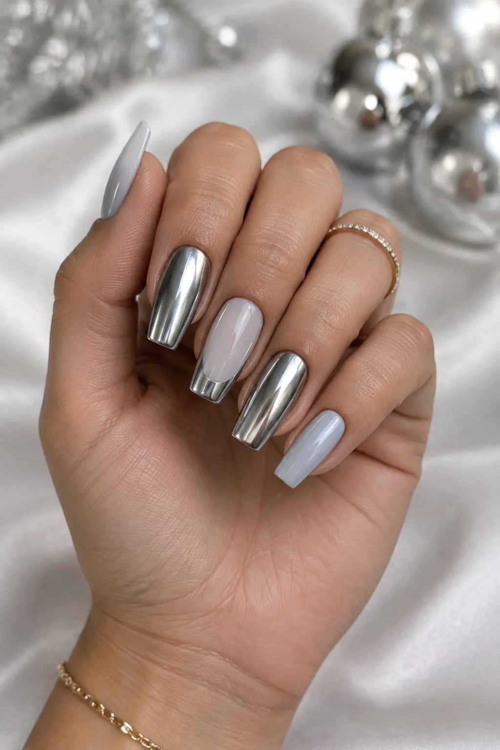 Short christmas nails with mirror silver chrome accents and grey