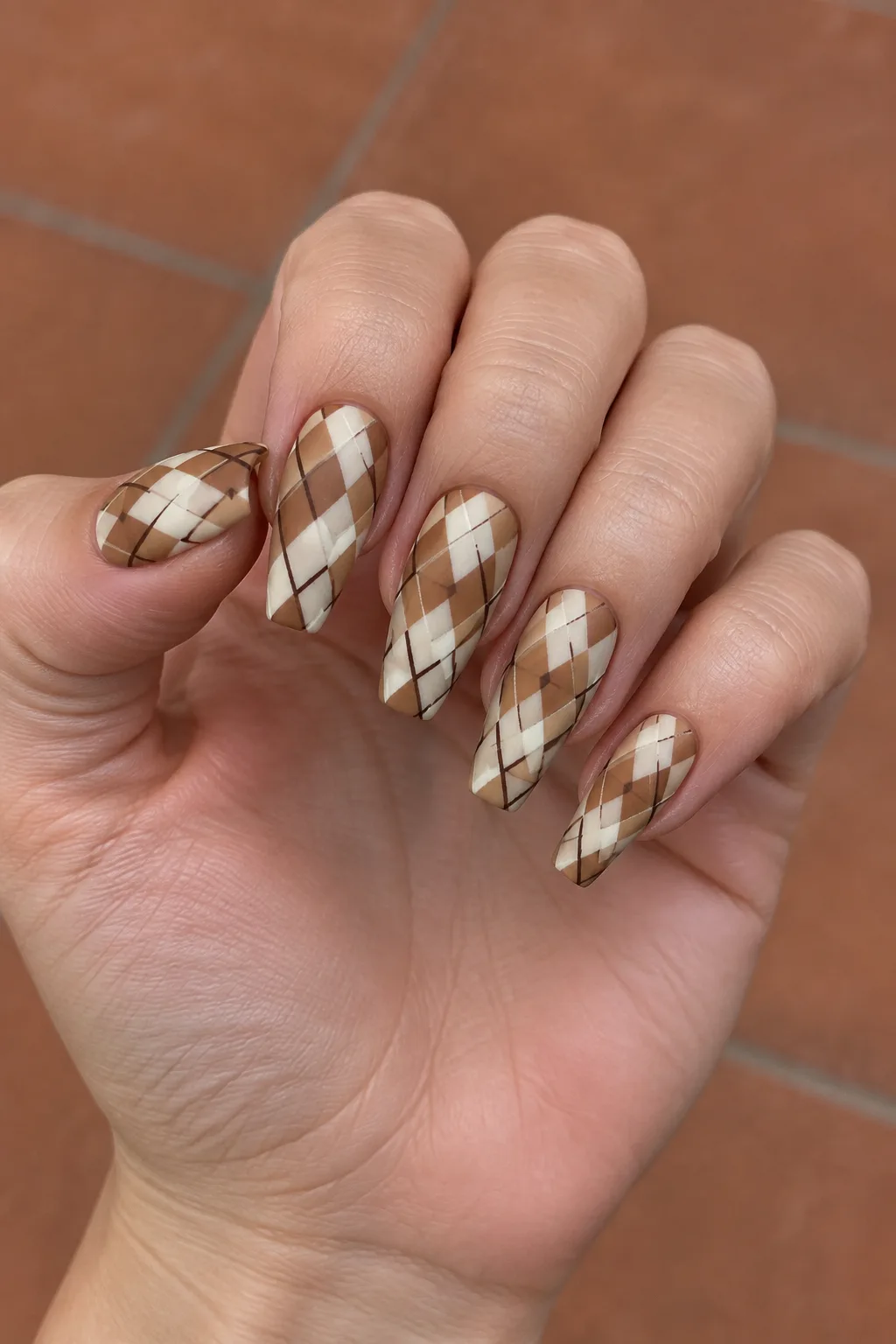 Camel and cream argyle sweater nails on medium coffin nails
